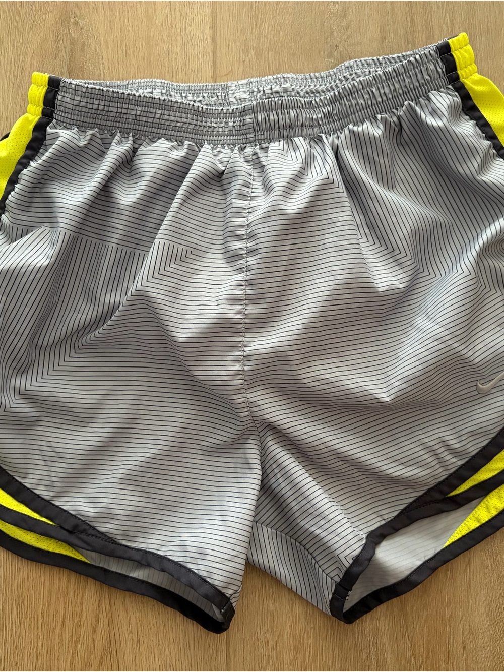 Nike White and Neon Yellow Pinstripe Athletic Shorts